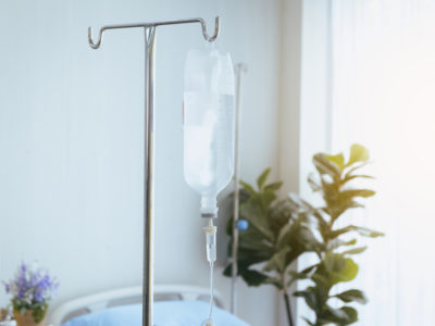 Close up of bottle saline solution and treatment in a hospital